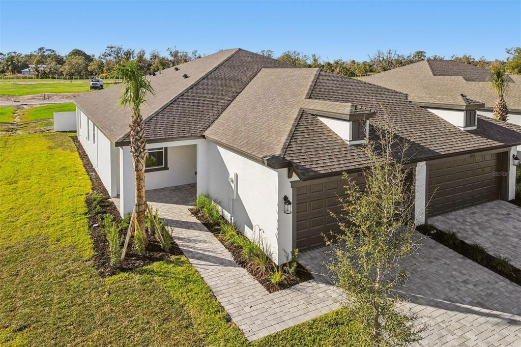 Photo of 9241 Optimist Way, Palmetto, FL 34221 (MLS # R4910266)