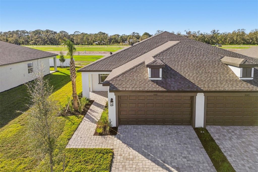 Photo of 9241 Optimist Way, Palmetto, FL 34221 (MLS # R4910266)