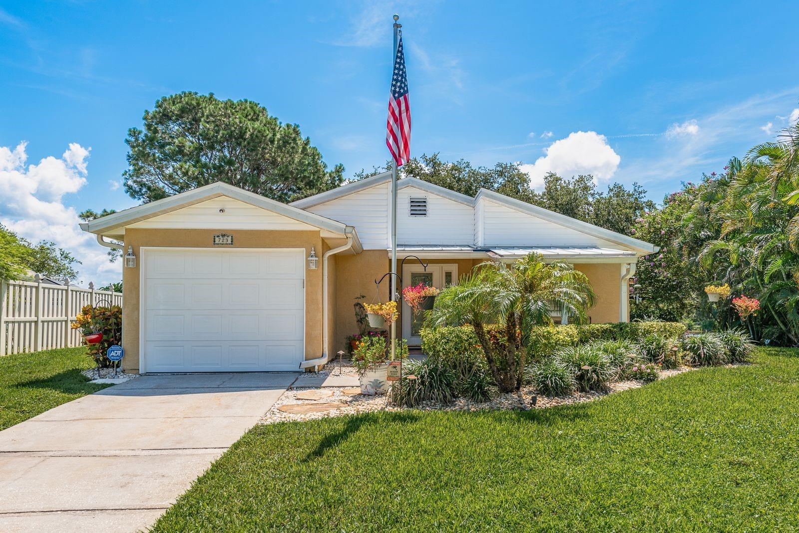 Discover your waterfront oasis at 723 Merlin's Court in Tarpon Springs, FL. This beautifully renovated 2-bedroom, 2-bathroom home offers a rare opportunity to enjoy serene lakeside living on Spring Lake, a pristine spring-fed body of water with over 200 feet of water frontage. Nestled on a half-acre, meticulously landscaped lot, this residence exudes the charm of "Old Florida" with breathtaking sunsets and peaceful surroundings. The home features a NEW ROOF, newer STAINLESS STEEL APPLIANCES, custom GRANITE COUNTERTOPS, and ample space to add a pool for even more outdoor enjoyment. Designed for comfort and tranquility, the home has never experienced flooding, ensuring peace of mind. Embrace the tranquil ambiance of this waterfront paradise while being just minutes from the historic Tarpon Springs Sponge Docks, stunning Gulf beaches, and the renowned Innisbrook Golf Club, home of the Valspar PGA Championship. Experience the perfect blend of nature, history, and leisure at this exceptional property.