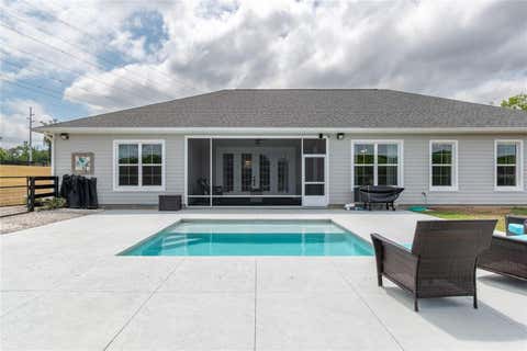 Tiny photo for 5021 NW 101st Street Road, Ocala, FL 34482 (MLS # OM723682)