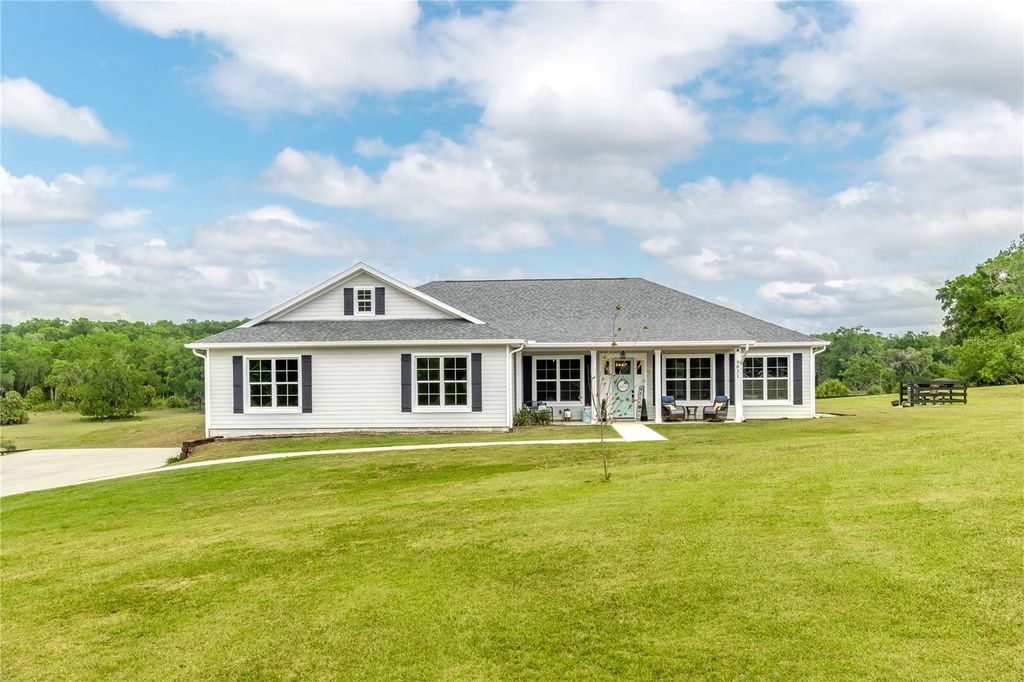 Photo of 5021 NW 101st Street Road, Ocala, FL 34482 (MLS # OM723682)