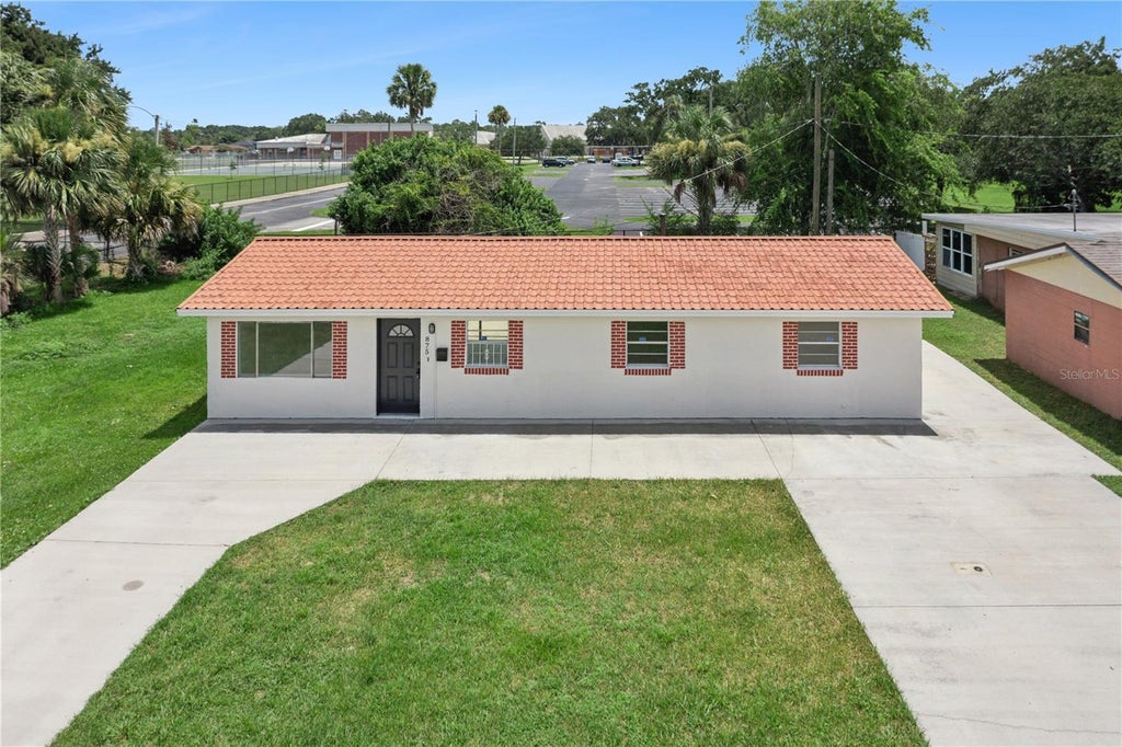Photo of 875 Loomis Avenue, Daytona Beach, FL 32114 (MLS # O6437932)