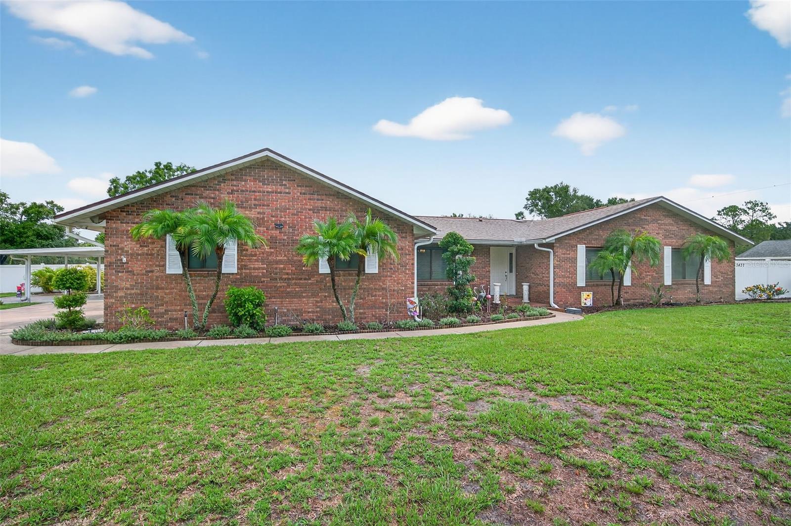 Beautiful One-Acre Pool Home on a Corner Lot in Lakeland!
Welcome to your dream home! Situated on a full 1-acre corner lot in a desirable Lakeland neighborhood, this move-in-ready property has it all—space, style, and standout features that are hard to find.
Step outside and fall in love with the oversized 16x13 inground pool, recently resurfaced and surrounded by a freshly updated deck and an enormous 48x48 screened lanai—perfect for entertaining or relaxing in your own private retreat. The backyard is beautifully landscaped and meticulously maintained, creating a true outdoor oasis the current owner will deeply miss.
Need space for projects or storage? You’ll love the large powered shed/workshop, offering endless possibilities for hobbies, tools, or extra storage. A covered carport for two additional vehicles and a spacious driveway complements the attached 2-car garage, making parking a breeze for you and your guests.
Inside, the home boasts an open floor plan filled with natural light and upgraded finishes throughout. Enjoy newer flooring, a large living room with cozy fireplace, and a modern kitchen featuring granite countertops and plenty of workspace. With 3 full bathrooms and a smart layout, this home is designed for both everyday comfort and effortless entertaining. There is also a space for an office if you were from home complete with a separate entrance to suit all of your needs. The office could also be a 4th bedroom if needed.
Even better? The roof is only 4 years old, offering peace of mind for years to come.
Homes like this—on a full acre with a pool, workshop, and modern upgrades—don’t come around often. Don’t miss your chance to make it yours. Schedule your private showing today—this one won’t last! PS. Comes with whole house generator and water system too!