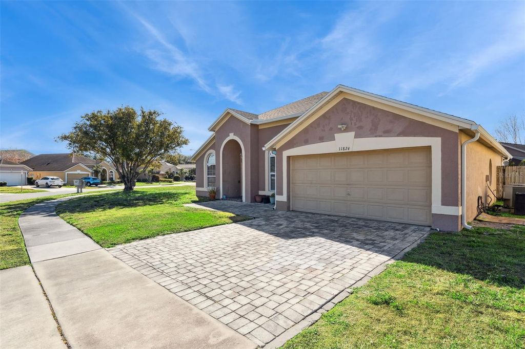 Photo of 11824 Hartfordshire Way, Orlando, FL 32824 (MLS # O6377784)