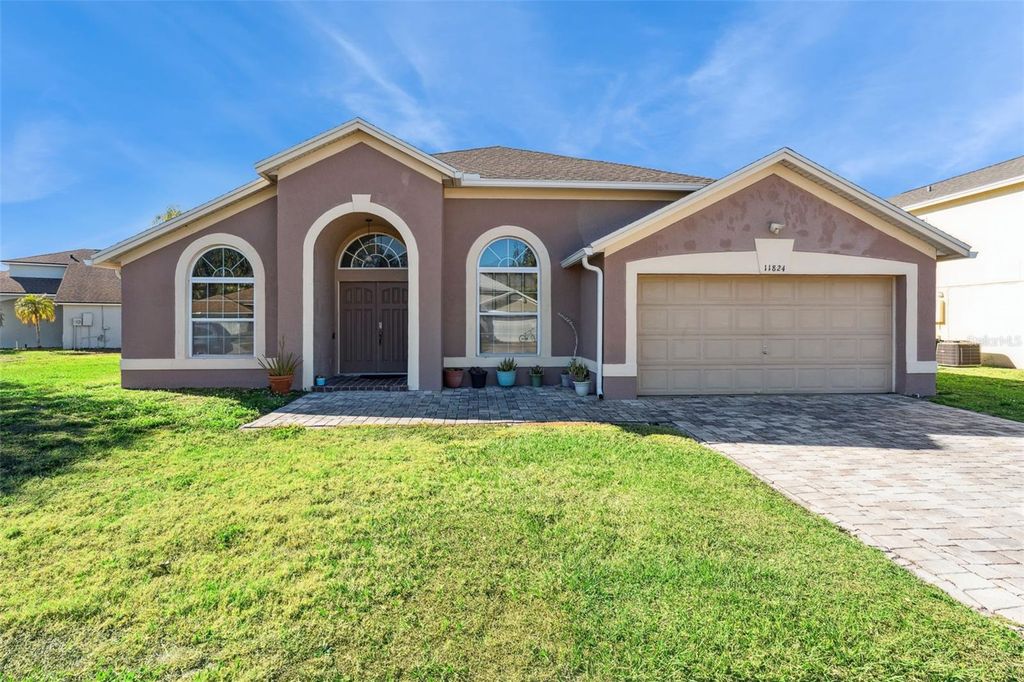 Photo of 11824 Hartfordshire Way, Orlando, FL 32824 (MLS # O6377784)