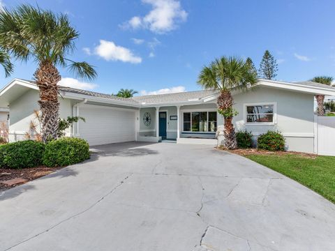 Photo of 10120 Paradise Boulevard, Treasure Island, FL 33706 (MLS # TB8436660)