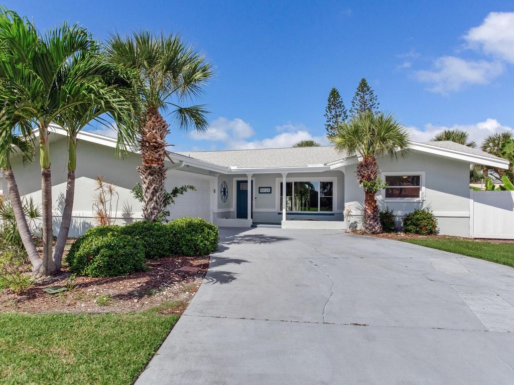 Photo of 10120 Paradise Boulevard, Treasure Island, FL 33706 (MLS # TB8436660)