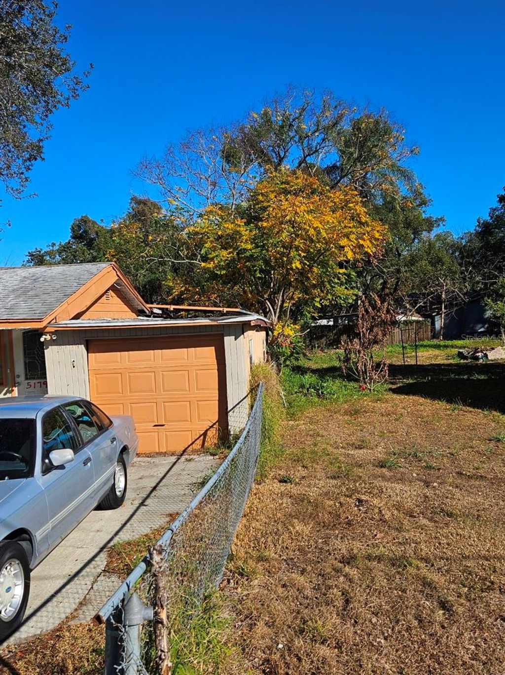 Photo of 5179 Gwynne Avenue, Orlando, FL 32810 (MLS # O6377602)