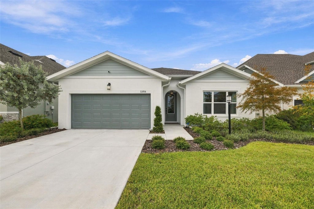 Photo of 11854 Mile Marsh Drive, Riverview, FL 33569 (MLS # TB8554972)
