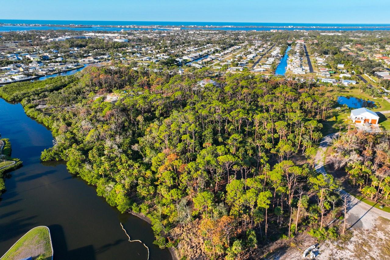 Exceptional 5-Acre Gulf-Access Waterfront Estate Lot
This is a rare opportunity to own nearly five acres of prime waterfront property with Gulf access—a truly unique offering in the area. Featuring over 200 feet of water frontage, this estate lot is the perfect canvas for creating your dream home/estate.
Property Highlights
Brand new 200+ ft of Rip Rap just added in July of 2025, Underground Utilities: Infrastructure already in place, with water and sewer lines as well as an FPL transformer extending halfway into the parcel.
Shoreline Improvements: Rip Rap installation along the entire shoreline has been approved by both county and state authorities. Completion is included in the price and will be finalized before closing.
Density Units: The parcel includes two density units for added development flexibility.
Spacious Neighboring Estates: Surrounded by 10 neighboring estate parcels ranging from 2.5 to 6 acres, with four currently under construction. Homes in the area range from 4,000 to 8,000 square feet and include auxiliary buildings like barns and boathouses.
Prime Location
Nestled in the heart of Englewood, this property offers a perfect balance of privacy and accessibility. Located close to:
Englewood Beach
Golf courses
Schools, restaurants, and shopping
This parcel is truly a one-of-a-kind opportunity to create your custom waterfront estate. Whether you envision a sprawling luxury home, a guest house, fishing pond, or auxiliary structures, the possibilities are endless.
Don’t miss out—contact us today to schedule a viewing or learn more about this exceptional property!