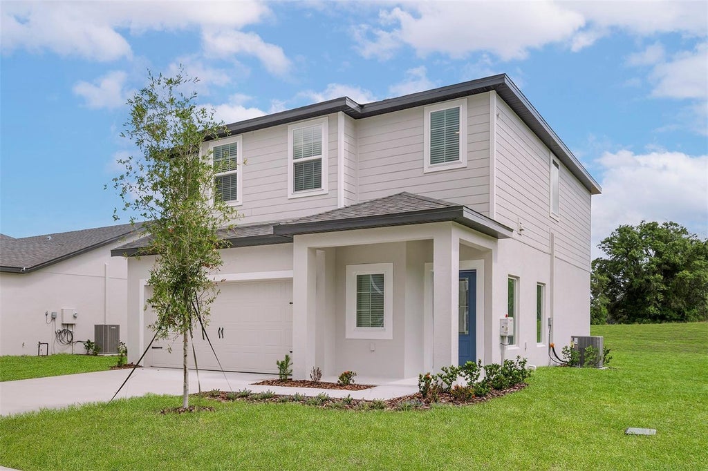 Photo of 13344 Tula Loop, Astatula, FL 34705 (MLS # TB8550949)