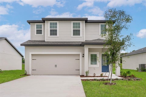Photo of 13344 Tula Loop, Astatula, FL 34705 (MLS # TB8550949)