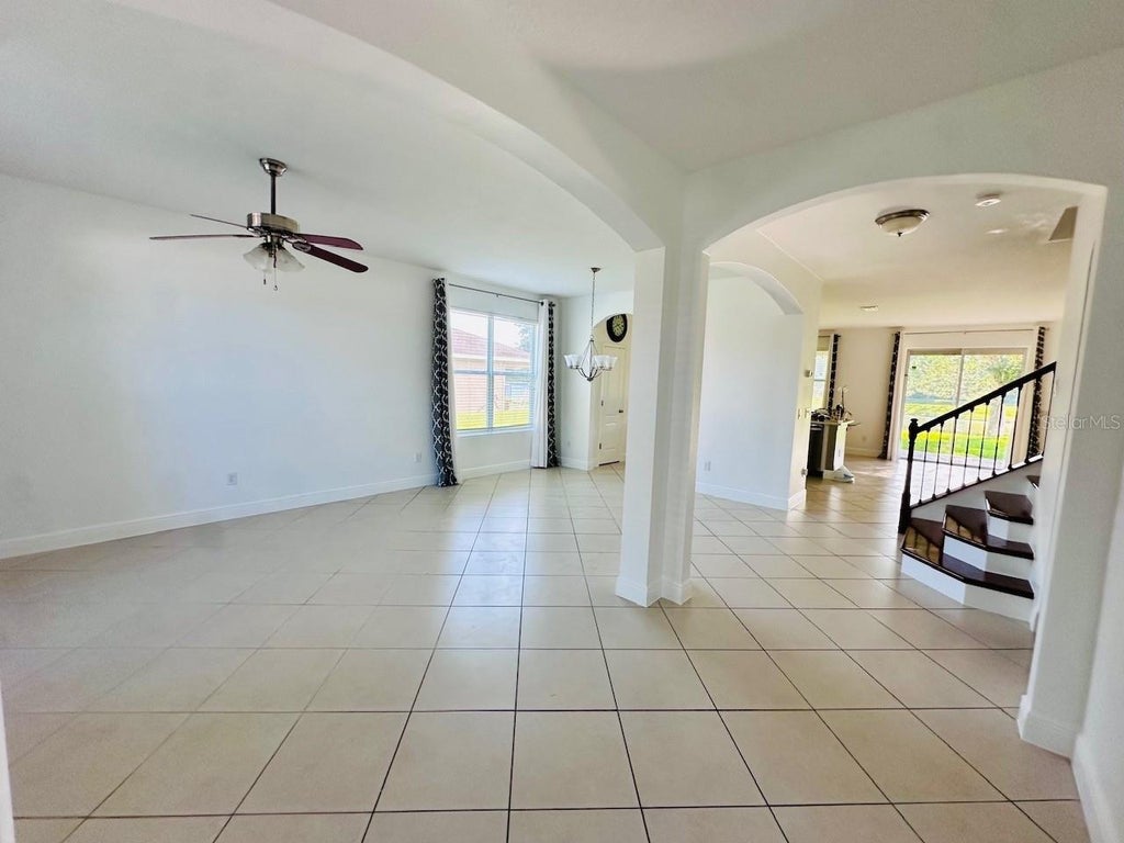 Photo of 10726 Cabbage Tree Loop, Orlando, FL 32825 (MLS # O6424557)