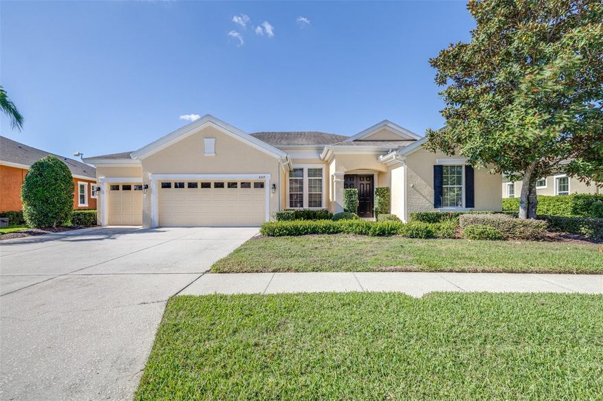 Welcome to 8919 Crystal Creek Court — a stunning 4-bedroom, 3-bathroom home with a 3-car garage, ideally situated on a quiet cul-de-sac in the highly sought-after gated community of Lakeshore Ranch in Land O’ Lakes! Step inside to discover a beautifully maintained home offering a true split floor plan, high ceilings, LED lighting throughout, and abundant natural light. The open-concept great room provides a spacious area for dining and entertaining, while the separate family room just off the kitchen offers additional living flexibility and comfort. The chef’s kitchen is a true showstopper, featuring high-end appliances including a Bosh 800 Series dishwasher, Café brand convection oven and refrigerator, microwave/oven combo, a Dacor cooktop, and a retractable exhaust vent that flushes with the cabinetry and vents to the exterior. You’ll love the massive island with built-in outlets, extra cabinets, and pantry storage, offering endless space for meal prep or a cozy coffee bar setup. Both gas and electric connections are available, giving you the best of both worlds. The primary suite offers a true retreat, with private access to the outdoor lanai, dual walk-in closets, and a spa-like ensuite bathroom featuring dual vanities, a large soaking tub, and a separate walk-in shower. The space combines luxury and practicality, creating a peaceful escape within the home. Throughout the home, you’ll find new laminate and tile flooring, designer ceiling fans, new blinds, and updated finishes. The fourth bedroom includes its own private bath, ideal for guests or in-laws, while the Jack-and-Jill bathroom connects the second and third bedrooms. Each bedroom offers generously sized walk-in closets, and the dedicated office provides the perfect setup for working from home. The back windows off the family room are hurricane-rated, providing both safety and energy efficiency. Step outside to a screened lanai with ceiling fans, overlooking a fully fenced backyard with dual gates—perfect for relaxation, play, or entertaining. The oversized 3-car garage is a dream come true, complete with epoxied flooring, insulation, a split A/C system, overhead storage, built-in racks that's perfect for a workshop setup—plus a ramp for accessibility and a new tankless water heater for added efficiency. Residents of Lakeshore Ranch enjoy resort-style amenities including a 24-hour fitness center, clubhouse, three pools (lap, fitness, and kiddie splash), aerobics and massage rooms, tennis, pickleball, and basketball courts, tot lot and playground, outdoor amphitheater, dog park, fishing dock, and lake access for canoes, paddle boards, and kayaks. The HOA fee includes internet, cable, and trash service, adding convenience and value. Conveniently located near top-rated schools, shopping, dining, and medical facilities, this home perfectly blends comfort, function, and modern design. Schedule your private showing today — this one won’t last long!