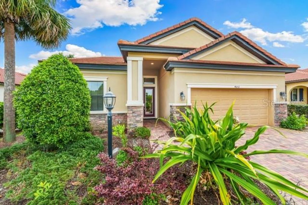 Photo of 4653 Royal Dornoch Circle, Bradenton, FL 34211 (MLS # A4689446)