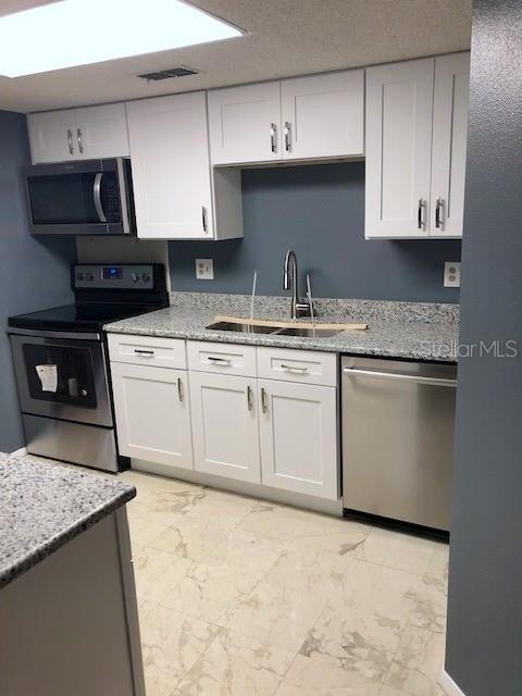 GARDENS OF FOREST LAKES CONDO THE - Residential