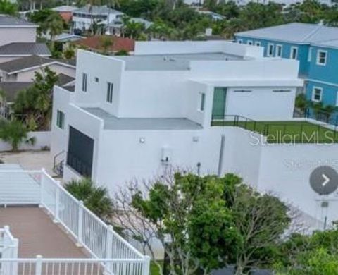 Photo of 635 Jungle Queen Way, Longboat Key, FL 34228 (MLS # O6354661)