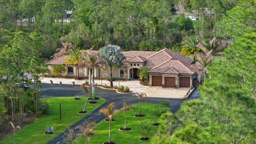 3-acre estate home in North Port Estates featuring 6 bedrooms, 4.5 bathrooms, 3,802 square feet, and a rare courtyard pool design. Built in 2017 with exceptional attention to detail, this custom estate features a resort-style courtyard with a heated pool, covered lanai, and outdoor fireplace, creating seamless indoor-outdoor living ideal for both entertaining and everyday living. Inside, the home highlights an open-concept floor plan with high-end finishes, spacious living areas, and abundant natural light throughout. The chef’s kitchen flows into the main living space, making it perfect for hosting gatherings of any size. A standout feature of the property is the attached 2 Bedroom in-law suite, complete with its own private entrance, full kitchen, living room, 2 large bedrooms, and oversized closets, offering the perfect setup for multigenerational living, extended guests, or potential rental income. Situated on 3 private acres with a long driveway, mature landscaping, and peaceful surroundings, this property provides a rare combination of privacy, space, and flexibility with no HOA restrictions. Conveniently located just 2 miles from the new Sarasota Memorial Hospital North Port campus, minutes from the I-75 on-ramp for easy access to Sarasota, Venice, and Naples, and approximately 4 miles from Publix, shopping, and dining, this home offers the perfect balance of quiet estate living and everyday convenience. This is a rare opportunity to own a gated estate with acreage, a private guest suite, and a courtyard-style pool in one of North Port’s most desirable areas.