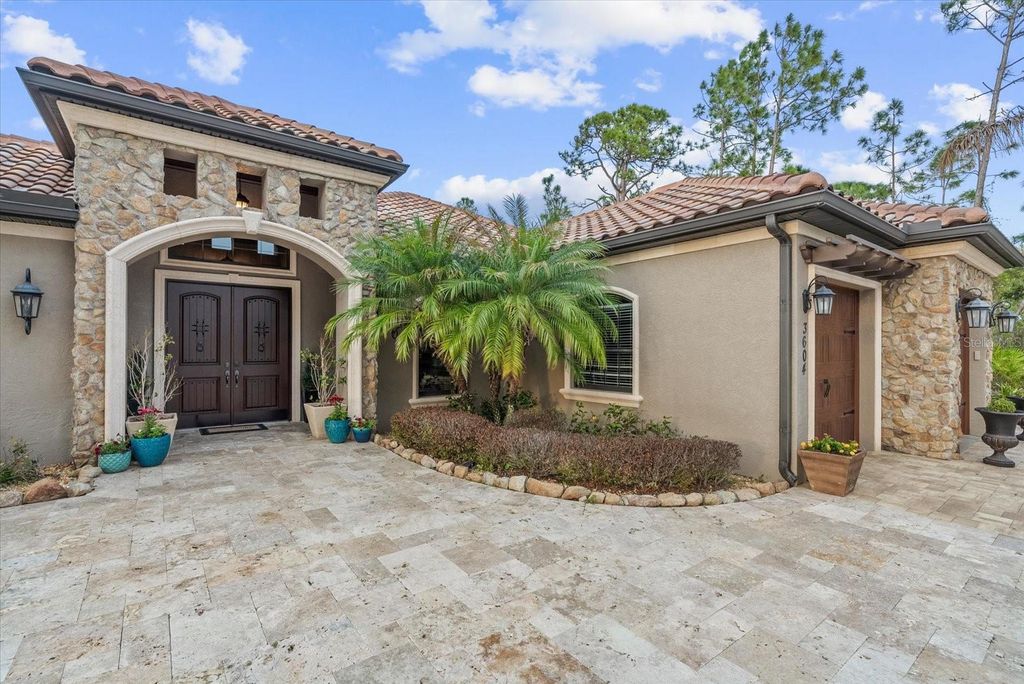 Photo of 3604 Tropicaire Boulevard, North Port, FL 34286 (MLS # A4686772)