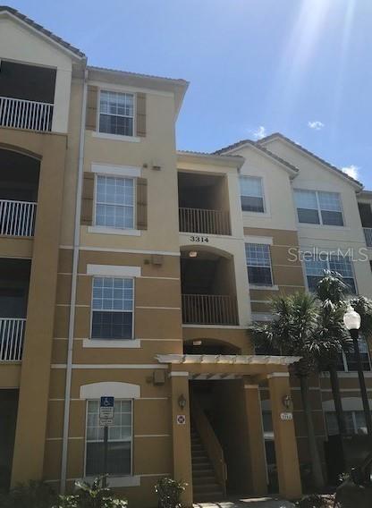 Photo of 3314 Robert Trent Jones Drive #406, Orlando, FL 32835 (MLS # S5154657)