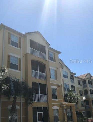 Photo of 3314 Robert Trent Jones Drive #406, Orlando, FL 32835 (MLS # S5154657)
