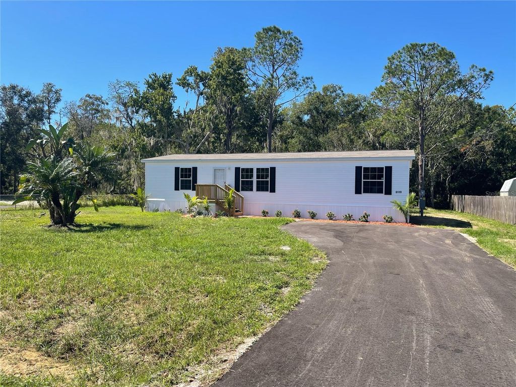 Photo of 6119 Mangrove Drive, Wesley Chapel, FL 33544 (MLS # TB8423110)