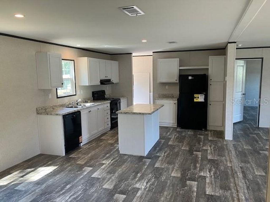 Photo of 6119 Mangrove Drive, Wesley Chapel, FL 33544 (MLS # TB8423110)