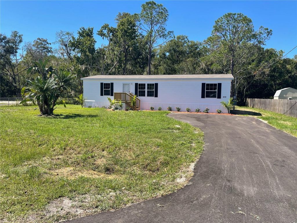 Photo of 6119 Mangrove Drive, Wesley Chapel, FL 33544 (MLS # TB8423110)
