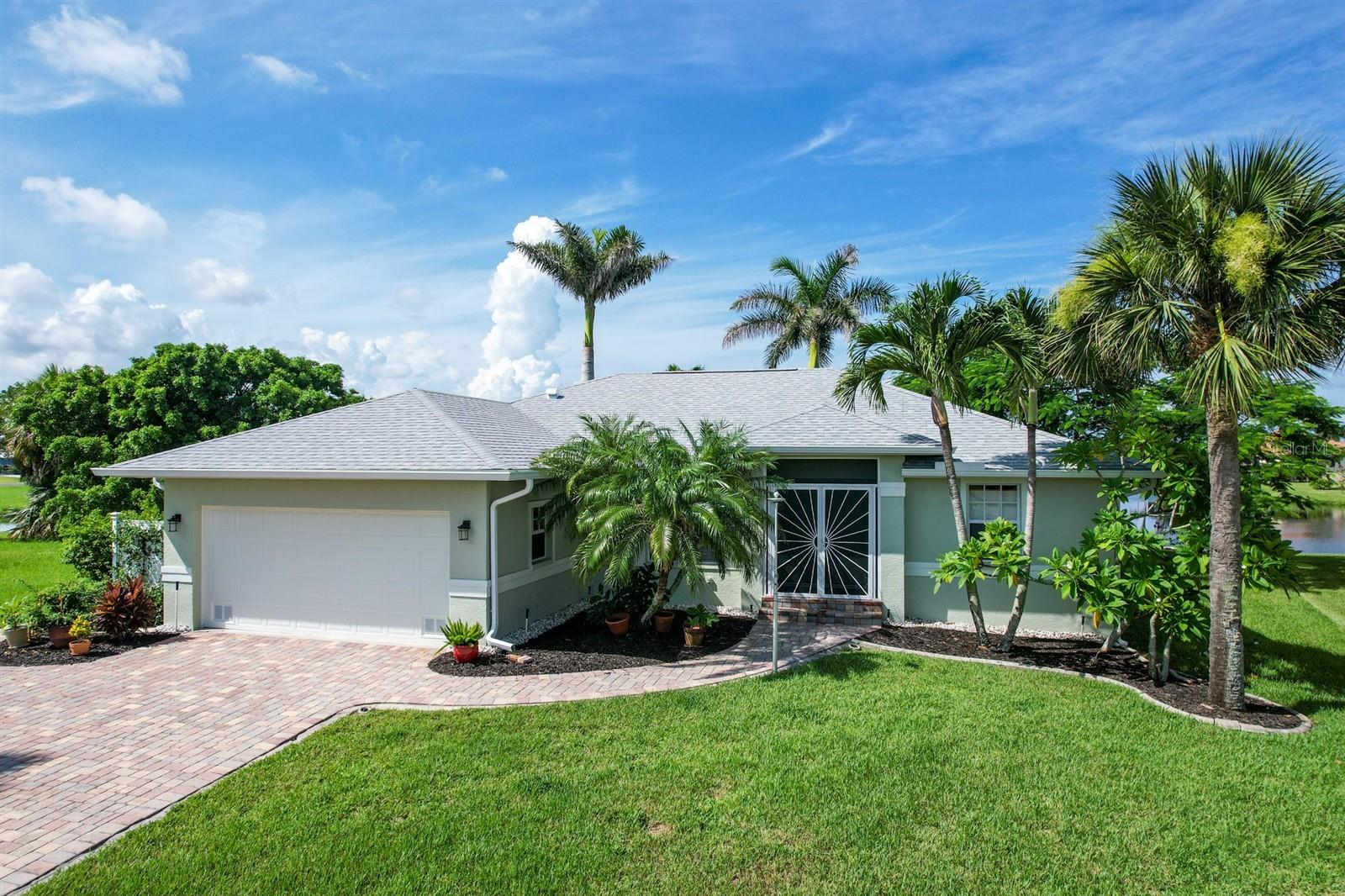 Experience Waterfront Living with Sustainable Comfort in Burnt Store Lakes!
Welcome to 16243 Nogales Ct—your private paradise nestled on serene Eagle Lake in the heart of Burnt Store Lakes. This meticulously maintained 3-bedroom, 2-bath pool home blends modern updates, sustainable living, and Florida charm all in one. Boasting 1,491 square feet of heated living space and over 2,100 total square feet, this home offers a bright open floor plan, cathedral ceilings, and stunning lake views.
Key Features Include:
*Waterfront Oasis: Relax on your lanai and enjoy views of Eagle Lake; irrigation is sourced directly from the lake—eco-friendly and efficient.
*Solar-Powered Savings: Owned solar panels (installed 2019) designed for net metering—electric bills average just $30–$50/month!
*Lush Landscaping: Enjoy your very own producing mango, banana, and lemon trees in a peaceful backyard retreat.
*Storm Ready: Accordion shutters on the lanai, hurricane shutters throughout, and a new roof (2023) and gutters for peace of mind.
*Private Pool: Recently resurfaced with gunite (2019), perfect for lounging or entertaining.
*Assumable VA Mortgage: Qualified buyers can assume the current 2.225 VA loan—a rare opportunity!
*Interior Comforts: Newer A/C (2020) with HEPA filtration, UV light, and MERV 11+ air purification for top-tier air quality.
*Updated Kitchen: Features stone countertops, 5-year-old stainless appliances (including convection oven & microwave), and a large peninsula for entertaining.
*Spacious Owner’s Suite: Includes two walk-in closets, en suite bath, and relaxing views.
*Garage Workshop: Built-in wooden workbench with drawers—ready for hobbyists or DIY enthusiasts.
Finishing Touches & Bonuses:
Elegant Hunter Douglas/Cuvée shades, wood flooring in bedrooms, and ceramic tile throughout.
Ceiling fans, window treatments, and thoughtful design details throughout.
Fully transferable pest control contract for added convenience.
Optional furnishings for turnkey enjoyment.
Community Perks (Low HOA—Only $494/Year!):
Enjoy all the amenities of Burnt Store Lakes, including kayak ramp, park, pickleball & tennis courts, fitness center, clubhouse, and direct access to Burnt Store Marina.
Location, lifestyle, and long-term value—this home has it all.
Schedule your private showing today and discover why 16243 Nogales Ct is Punta Gorda’s best-kept secret.