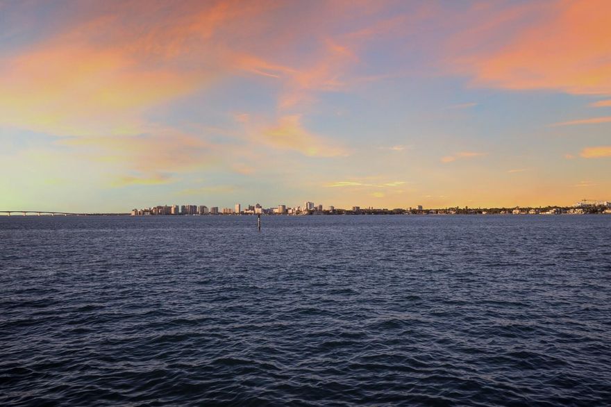 Set along one of Siesta Key’s most coveted bayfront streets, this exceptional property offers some of the most breathtaking views in all of Sarasota—spanning open water, the city skyline, and endlessly changing sunsets. Positioned in an enclave of multi-million-dollar homes, the location alone is extraordinary, with deep, open boating water and immediate access to Sarasota Bay. While the true value lies in the irreplaceable bayfront land, the home itself has been recently remodeled and exudes a charming Siesta Key cottage vibe—warm, inviting, and perfectly suited for relaxed coastal living. Thoughtful updates blend seamlessly with the home’s character, creating a space that feels both comfortable and refined. Outdoors, enjoy a private pool overlooking the water, ideal for entertaining or unwinding after a day on the bay. A two-car garage provides convenience and storage, while the property’s proximity to world-famous Siesta Beach, downtown Sarasota, and Sarasota Memorial Hospital offers unmatched lifestyle appeal. Whether envisioned as a serene waterfront retreat, a rental investment, or the future site of a custom estate, this bayfront opportunity combines remarkable views, premier boating, and one of the finest locations on Siesta Key.