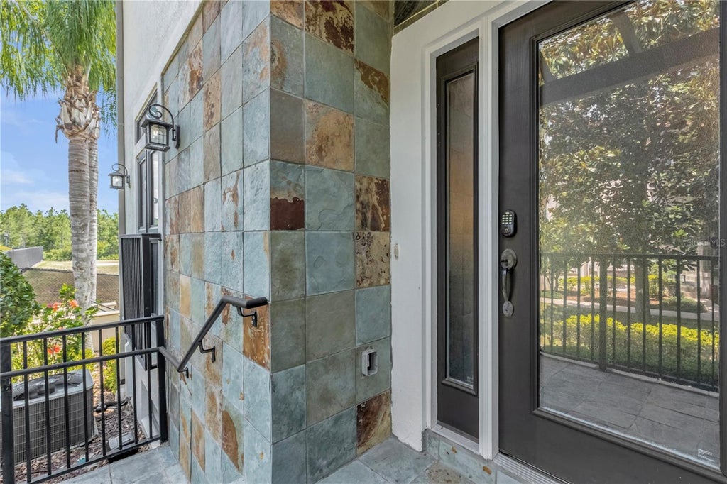 Photo of 8501 Kediaman Avenue #8501, Orlando, FL 32821 (MLS # O6423580)