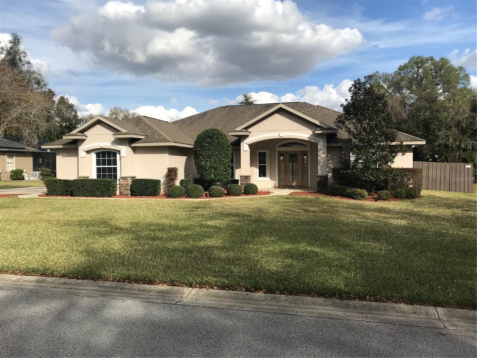 Pictures coming soon. Enter address on Zillow for current pics. Very nice 2300+ Sq ft Great room plan, 4 Beds, 2 Baths, 2 car garage. Tile flooring throughout. Cathedral Ceiling in main area. Maple cabinets and Corian countertops in kitchen. Master bedroom suite features his and hers vanities, walk in closets, jetted tub and walk in shower. Fenced back yard in gated community of Cobblestone in Belleview. Park in neighborhood just 1 block away. Call about dog size.