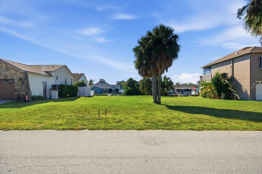 Imagine waking up every day on your own piece of Florida’s west coast. This vacant waterfront lot in Hudson offers 60 feet of seawall with direct canal access to the Gulf of America, making it the perfect spot for anyone dreaming of a coastal lifestyle. The property is cleared, level, and ready to build, giving you the freedom to design the home you’ve always wanted. Whether you're planning a weekend getaway or a full-time waterfront retreat, this location offers quick boating access, stunning sunsets, and the laid-back Gulf atmosphere that makes this area so popular. Bring your plans, bring your boat. Your Florida waterfront lifestyle starts right here.