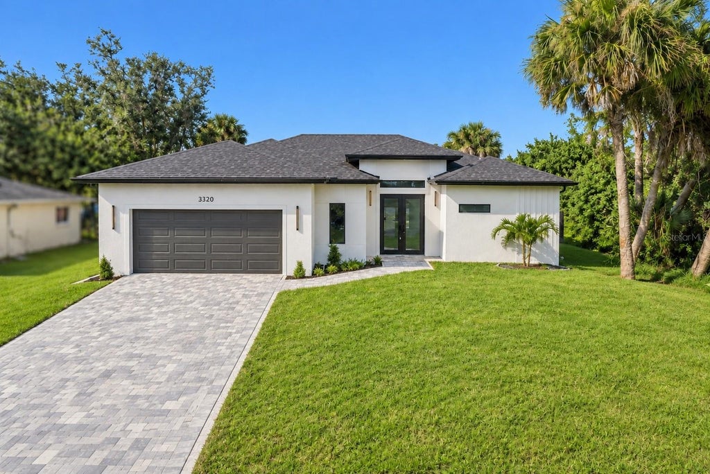 Photo of 3320 Tupelo Avenue, North Port, FL 34286 (MLS # A4706758)