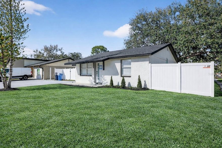 Beautifully renovated 3-bedroom, 2-bath corner-lot home located in the heart of Town ’N’ Country. This move-in ready property features bright, open living spaces and a flexible layout ideal for an in-law suite or rental potential. The primary bedroom offers a private en-suite bathroom and walk-in closet.

Fully renovated with permits, including a new roof, new HVAC system with all new ductwork, complete electrical and plumbing replacement, new tile flooring throughout, and new interior doors and finishes. The modern kitchen features custom cabinetry, premium stone countertops, and brand-new appliances. Bathrooms have been fully updated with luxury tile and glass shower enclosures.

Additional upgrades include new ceiling insulation, new exterior entry and sliding glass doors, new water heater, a fully enclosed PVC privacy fence with gated access, and a landscaped garden with automatic accent lighting.

Convenient access to Tampa International Airport, major highways, shopping, and dining.