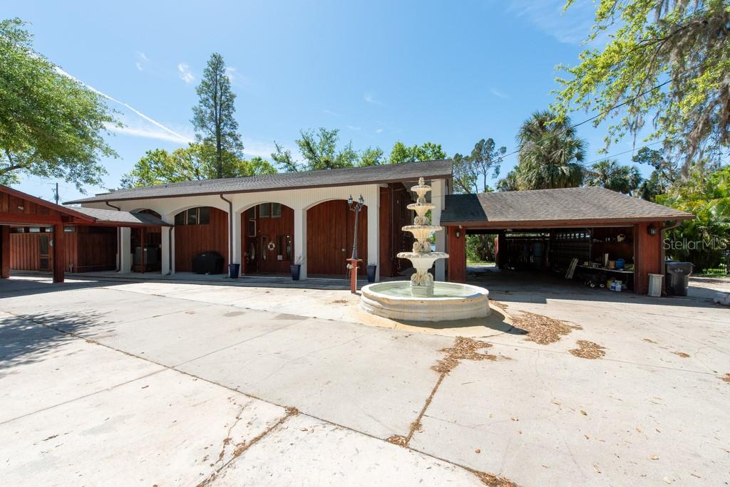 Fully Renovated Ultimate Waterfront Investment Opportunity on the Alafia River! An unparalleled investment opportunity awaits on the stunning Alafia River! This income-producing, turn-key property features three separate buildings on over an acre of prime waterfront land, offering a total of 9 bedrooms, 7.5 bathrooms, and over 5,000 square feet of heated space. Whether you're seeking a lucrative Airbnb, a multi-generational compound, or an event-friendly retreat, this property is designed to impress. This exceptional property includes three distinct residences. The main home boasts spacious living areas with stunning river views, high-end finishes, and an entertainer's dream layout. The guest house is a private 3-bedroom, 2.5-bathroom residence complete with its own kitchen and laundry room. Additionally, there is a 1-bedroom studio apartment (not currently in the rental program) with potential for $1,000/month in additional income. Outdoor amenities set this property apart. A 175-ft, two-story dock features an upstairs sun deck, covered boat lift, fish cleaning station, shower, refrigerator, city water, and electricity. The property also includes three boat slips, available to rent for additional passive income ($1,000+/month potential). A private pool, outdoor kitchen, two 67-ft lanais with breathtaking river views, and multiple outdoor dining areas equipped with gas grills make this a true waterfront paradise. Plus, with no HOA or CDD, you have complete freedom over your investment. Luxury and entertainment abound throughout the home. Enjoy four master suites, each with en-suite bathrooms and walk-in showers. Additional features include an indoor hot tub, dry sauna, built-in HD projector, pool table, and fitness room. The property is also equipped with three fully furnished kitchens, three laundry rooms, and elegant touches such as stained glass accents. A 5-car garage, including a roundabout garage with dual doors, provides ample covered parking. A gated entry with an elegant fountain and expanded driveway ensures privacy and grandeur upon arrival. This property is a proven income producer with over $225,000 in gross annual revenue, even with a low occupancy rate. Future bookings already total $100,000, and $75,000 in furnishings are included. With the addition of a dedicated website, projections indicate an additional $100,000+ in yearly revenue. Its size and amenities make it a perfect venue for large family groups, weddings, and special events. Location is another key advantage. This home is minutes from Tampa Bay by boat, making it one of the closest riverfront properties to open water. It is also just 15 minutes from Busch Gardens, 20 minutes from Downtown Tampa, and offers easy access to I-75. Whether you are a boater, angler, or water sports enthusiast, the brackish waters of the Alafia River provide the ideal setting for fishing and kayaking. This is more than just a home—it's an unmatched investment and lifestyle opportunity. Whether you're looking to generate multiple income streams or secure a one-of-a-kind waterfront retreat, this property delivers on all fronts. Schedule your showing today and see firsthand why this Alafia River gem is a true Airbnb powerhouse!