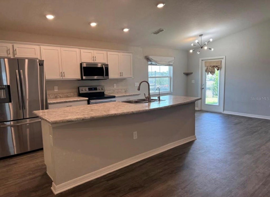 Photo of 1100 Zion Drive, Haines City, FL 33844 (MLS # S5158126)