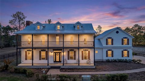 Photo of 34175 Steeple Chase Way, Callahan, FL 32011 (MLS # O6386613)