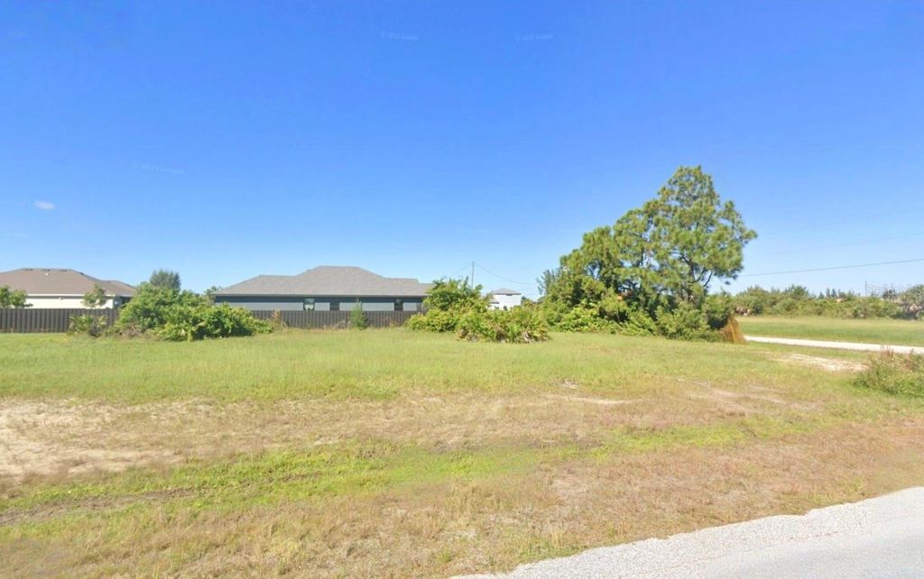 Photo of 2416 NW 9th Terrace, Cape Coral, FL 33993 (MLS # TB8481369)