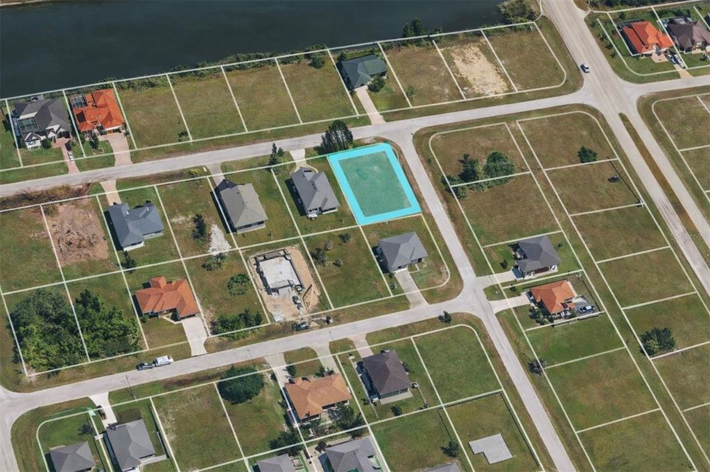 Photo of 2416 NW 9th Terrace, Cape Coral, FL 33993 (MLS # TB8481369)