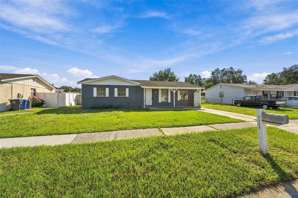 Photo of 8527 Gold Ridge Circle, Tampa, FL 33619 (MLS # TB8558706)