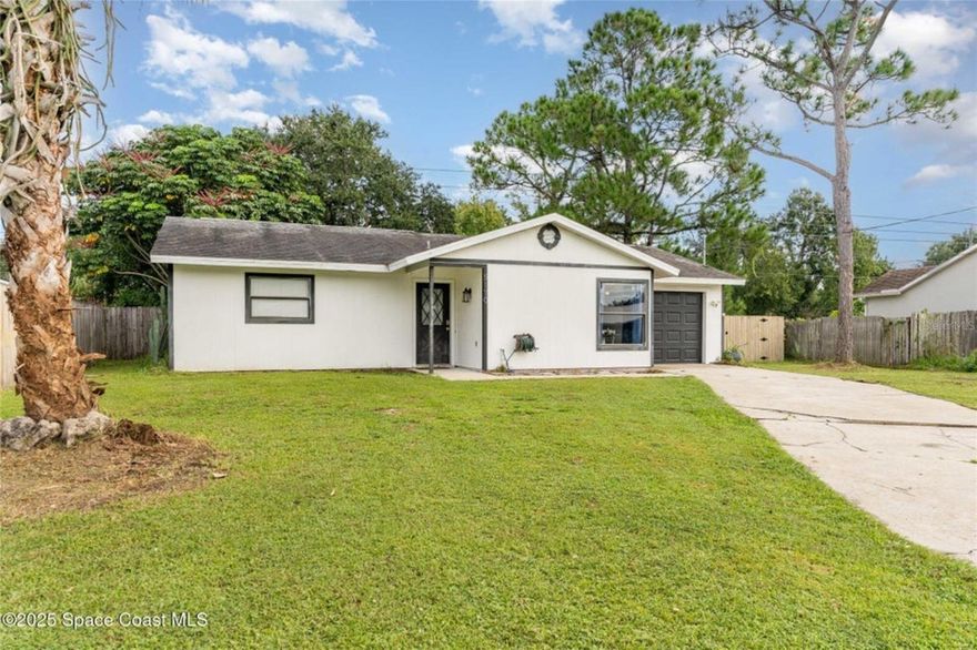 Opportunity is knocking! Spacious 2 bedroom, 1 bathroom. 1 car garage home in PSJ. This house is ready for someone to put there personal touches on it and make it their own, A little TLC and she will shine bright like a diamond. Enjoy an open floorplan with a very large eat in kitchen with tons of cabinet and counter space. Out back is a screened porch and fenced back yard. Watch rocket launches from your yard and feel the rumble of them too. Close to schools and restaurants, a quick drive to KSC, the river and beaches, the airport and theme parks too. Location is key!