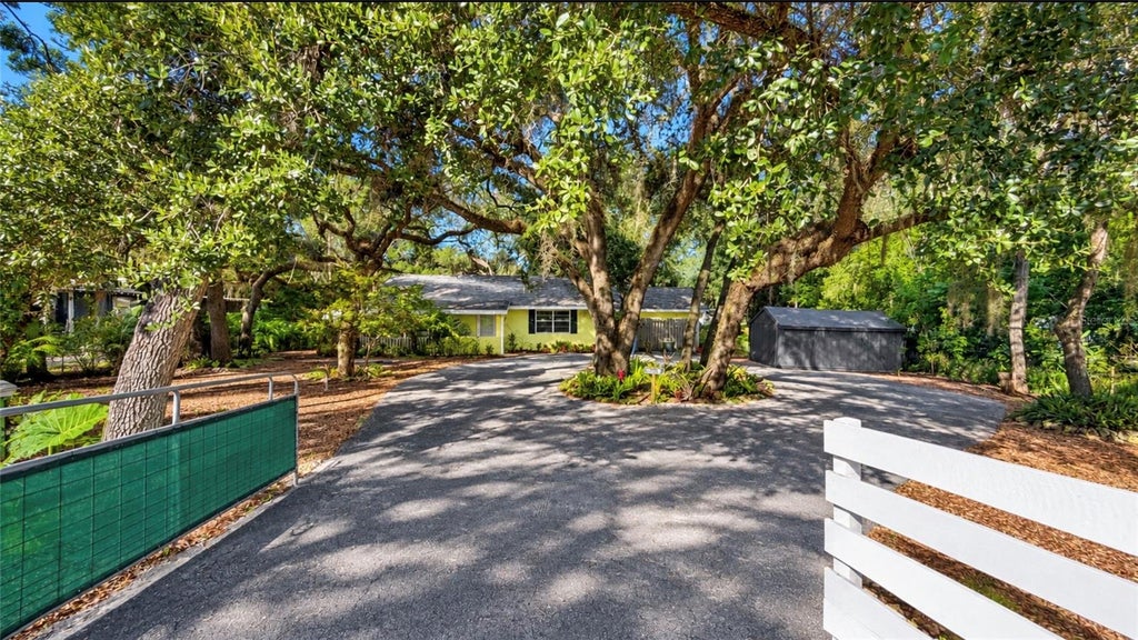 Photo of 12325 Hicks Road, Hudson, FL 34669 (MLS # TB8561298)