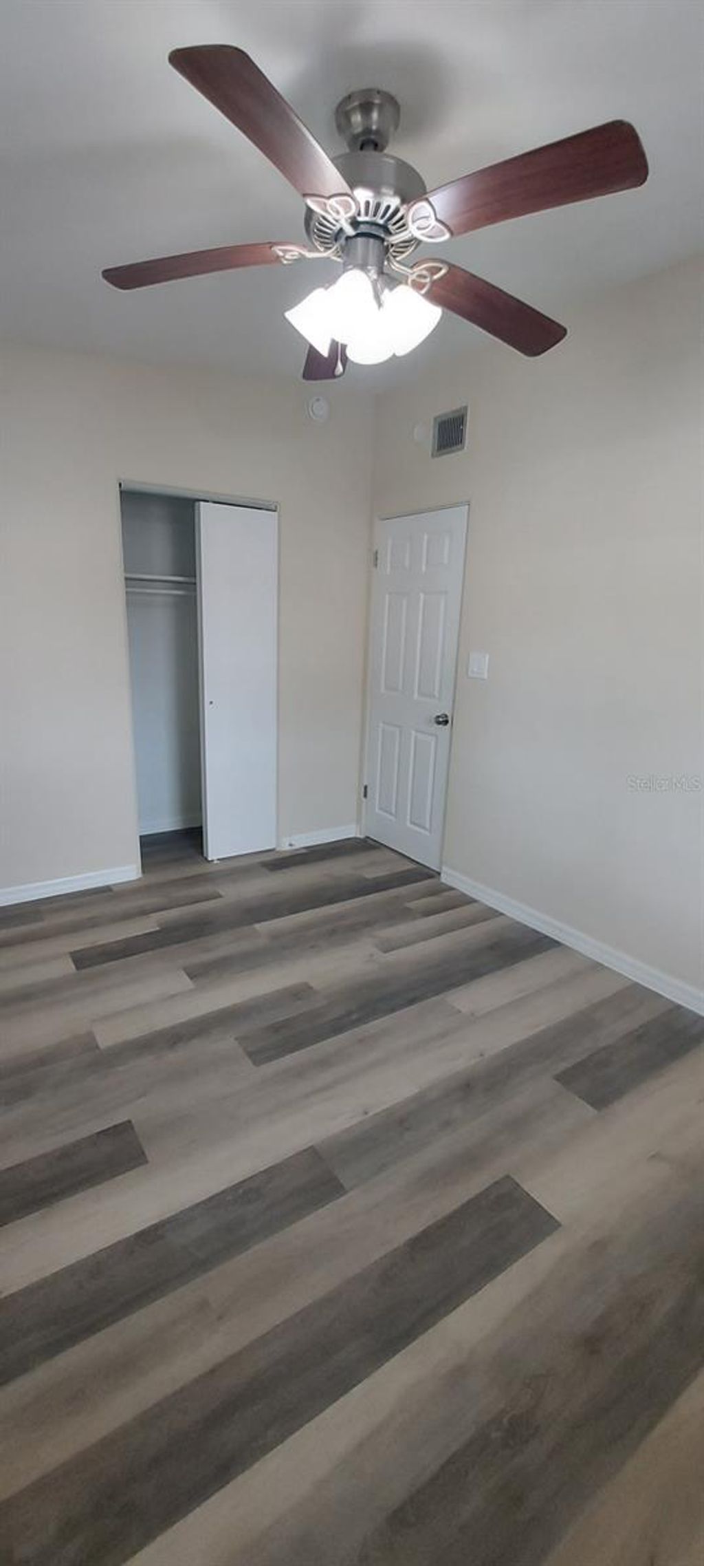 Photo of 665 E Church Avenue, Longwood, FL 32750 (MLS # O6350420)