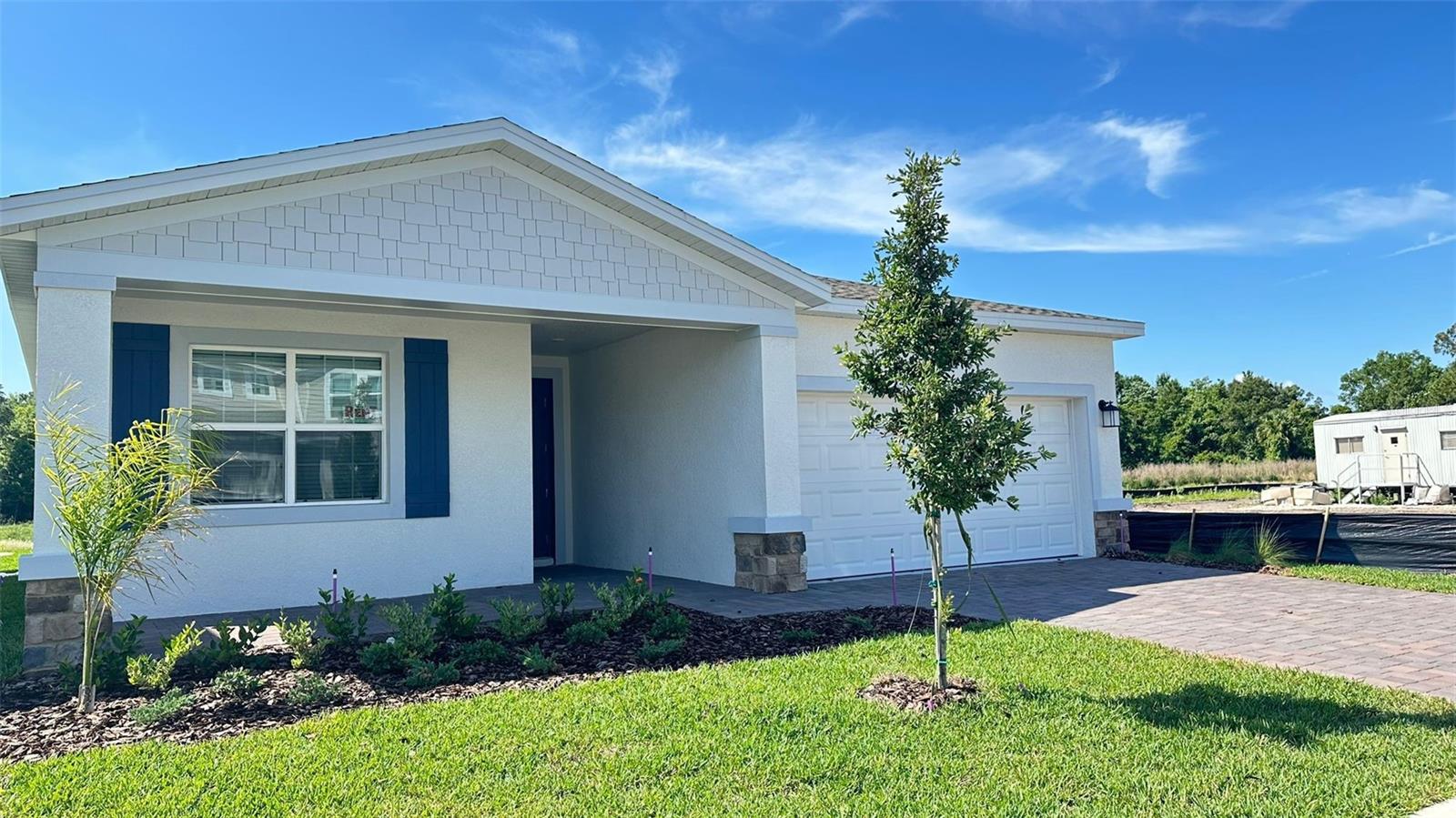 Welcome to this beautiful home located in the highly desirable guard-gated Providence Golf Community in Davenport. Featuring 3 bedrooms, 2 bathrooms, plus a versatile den/office, the property offers an open-concept layout with a bright living area, elegant tile flooring, a modern kitchen with stainless steel appliances, stone countertops, and a large island perfect for entertaining. The primary suite includes a private bath and walk-in closet, while the additional bedrooms provide comfort with plush carpeting. Outside, enjoy a covered patio, spacious backyard, and 2-car garage. Providence offers resort-style amenities, including a championship golf course, clubhouse with restaurant, fitness center, tennis courts, two pools with water slide, playgrounds, dog park, walking trails, and 24-hour security.** MOVE IN NOW AND ENJOY 2 WEEKS FREE RENT! ** Ideally located just minutes from shopping, dining, and a short drive to Disney, this home combines modern comfort with resort-style living.