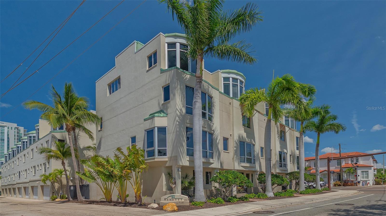 A private enclave of 29 luxury townhomes nestled in the heart of downtown Sarasota. Single family privacy in a 4-story townhouse w/private 2 car garage, individual elevator & terrace level studio w/floor to ceiling glass. New washer & dryer, Storage built-in under stairs. Signature rooftop terrace design allows every residence the penthouse amenity of its own private indoor/outdoor entertainment level. Summer kitchen with wet bar, small refrigerator & sundeck. Close to Starbucks for your morning cup of java and return home to your fourth-floor panoramic views of the city. Close to Bay front Park, downtown shopping, and restaurants. The Florida Studio Theater is right next door, and the Sarasota Opera House is just a block away. Marquee En Ville is a gated community with a heated community pool and fitness center. There is simply nothing else like this home in the downtown area.