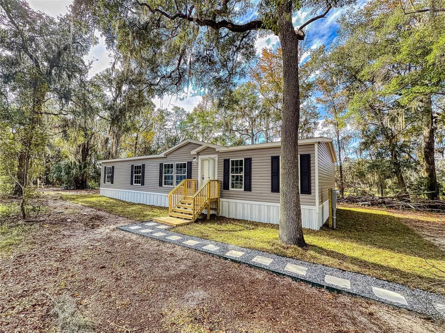 Looking for a peaceful country retreat, this beautifully updated 3-bedroom, 2-bath home offers rustic charm and modern convenience. Featuring an open floor plan, fresh paint throughout, new carpet, and brand-new stainless-steel appliances, this home is move-in ready.
Enjoy lower utility costs with a new well and septic system. Come and relax on 1.25 acres of beautiful nature in Marion County. 
Whether you’re seeking a winter getaway or a year-round residence, this serene estate is the perfect choice.
Don’t wait—priced to sell schedule a showing today and let us help you make it home!