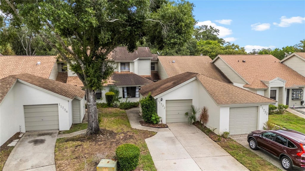 Photo of 11732 Rolling Pine Lane, Port Richey, FL 34668 (MLS # TB8550630)