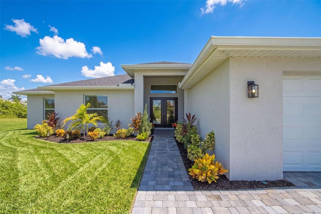 Photo of 2305 NW 34 Avenue, Cape Coral, FL 33993 (MLS # O6439493)