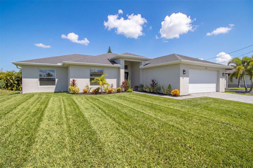 Photo of 2305 NW 34 Avenue, Cape Coral, FL 33993 (MLS # O6439493)